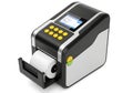 Modern industrial thermal label printer with a digital screen interface and a paper roll isolated on a white background studio Royalty Free Stock Photo