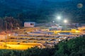 Modern industrial wastewater treatment plant at night. Aerial view of sewage purification tanks Royalty Free Stock Photo