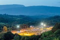 Modern industrial wastewater treatment plant at night in Mountainous region. Aerial view Royalty Free Stock Photo