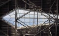 modern industrial glass window shaped in the ceiling with beams