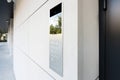 Modern Intercom Panel Mounted On Clean White Wall Panels At Contemporary Building Entrance Royalty Free Stock Photo