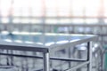 Modern interior of cafeteria or canteen with stainless steel chairs and tables Royalty Free Stock Photo