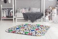 Modern interior of the child`s bedroom with carpet in front Royalty Free Stock Photo