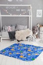 Modern interior of the child`s bedroom with carpet in front Royalty Free Stock Photo