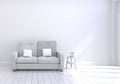 Modern interior design of living room with grey sofa with white and wooden glossy floor and photo frame. White cushions elements. Royalty Free Stock Photo