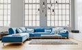 Modern interior design of living room, large modular blue velvet sofa with white pillows, high ceiling, huge windows