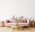 Modern interior design of living room with pink sofa, dry plants decoration and empty white mock up wall background Royalty Free Stock Photo