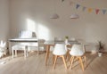 Modern interior with eating table and white e-piano Royalty Free Stock Photo