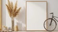 A modern interior featuring a blank frame, decorative plant, and bicycle, perfect for showcasing minimalist design Royalty Free Stock Photo
