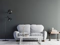 Modern interior with grey empty wall & sofa with low table on floor. Royalty Free Stock Photo