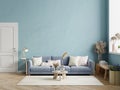 Modern interior of living room with dark sofa on dark blue wall background Royalty Free Stock Photo