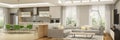 Modern interior of living room with the kitchen in a house or apartment in grey colors with green accents Royalty Free Stock Photo