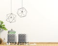Modern interior with padded stool, decor and lamps. Wall mock up. Royalty Free Stock Photo