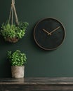 A modern interior with plants and a clock on a green wall. Royalty Free Stock Photo
