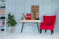 Modern interior room for school child at home. Desk and chair in a child bedroom for education. Books, abacus, board, red backpack Royalty Free Stock Photo