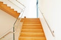 Modern interior with wooden stairs Royalty Free Stock Photo