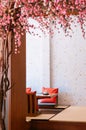 Modern Japanese restaurant interior with artificial Sakura tree