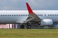 A modern jet carrier at final approach touch down runway Royalty Free Stock Photo