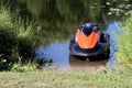 Modern jet ski floats near the shore Royalty Free Stock Photo