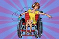 Modern joyful teen girl disabled in a wheelchair, listening to m