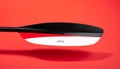Modern Kayak Paddle on Red Background Royalty Free Stock Photo
