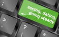 Modern keyboard with seeing, dating, going, steady text symbols Royalty Free Stock Photo