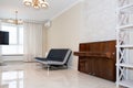 Modern kitchen area attached to the living room. Interior design with classic or vintage and modern elements. Royalty Free Stock Photo