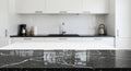 Modern Kitchen Black Marble Countertop Empty Table Clean minimalist modern kitchen black marble countertop empty space white Royalty Free Stock Photo