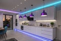 Modern kitchen with colored LED lights Royalty Free Stock Photo