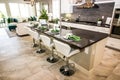 Modern Kitchen With Counter Bar & Stools Royalty Free Stock Photo