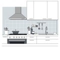Modern kitchen design featuring a flat-top stove with a range hood, light gray tiled Royalty Free Stock Photo