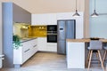 Modern kitchen design in light interior.