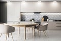 Modern kitchen design with white herringbone backsplash and wooden details, elegant interior. Royalty Free Stock Photo