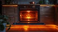 Cozy kitchen ambience featuring open oven with warm orange glow