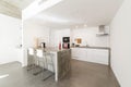 Modern kitchen gray tile floor and white wall