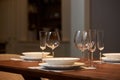 Modern kitchen interior with clean white plates, glasses and cut Royalty Free Stock Photo