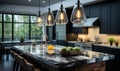 Modern kitchen interior with dark wood cabinets marble countertops and stainless steel appliances illuminated by pendant lights Royalty Free Stock Photo