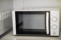 Modern kitchen interior with electric and microwave oven. Royalty Free Stock Photo