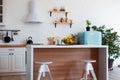 Modern Kitchen Interior with Island, Sink, Cabinets, and Big Window in New Luxury Home. Royalty Free Stock Photo