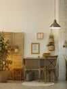 Modern kitchen interior with wooden crates and plants as eco furniture. Royalty Free Stock Photo