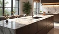 Modern kitchen island with white marble countertop featuring natural veining. Dark cabinets complement elegant stone surface, Royalty Free Stock Photo