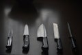 Modern Kitchen Knives Set on Stone Background. Chefs Knives Concept. Food, meal. Royalty Free Stock Photo