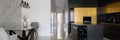 Modern kitchen open to fancy dining area, panorama Royalty Free Stock Photo