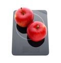 Modern kitchen scale with fresh red apples isolated on white Royalty Free Stock Photo