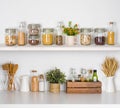 Modern kitchen shelves with various food ingredients on white background Royalty Free Stock Photo