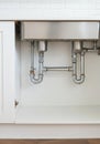 Modern kitchen sink plumbing system installation Royalty Free Stock Photo