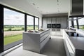 modern kitchen with sleek and stylish aluminium windows overlooking the view