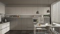 Modern kitchen with table and chairs, big windows and herringbone parquet floor, white and gray minimalist interior design Royalty Free Stock Photo