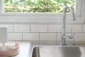 Modern kitchen with white worktop sink