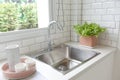 Modern kitchen with white worktop sink Royalty Free Stock Photo